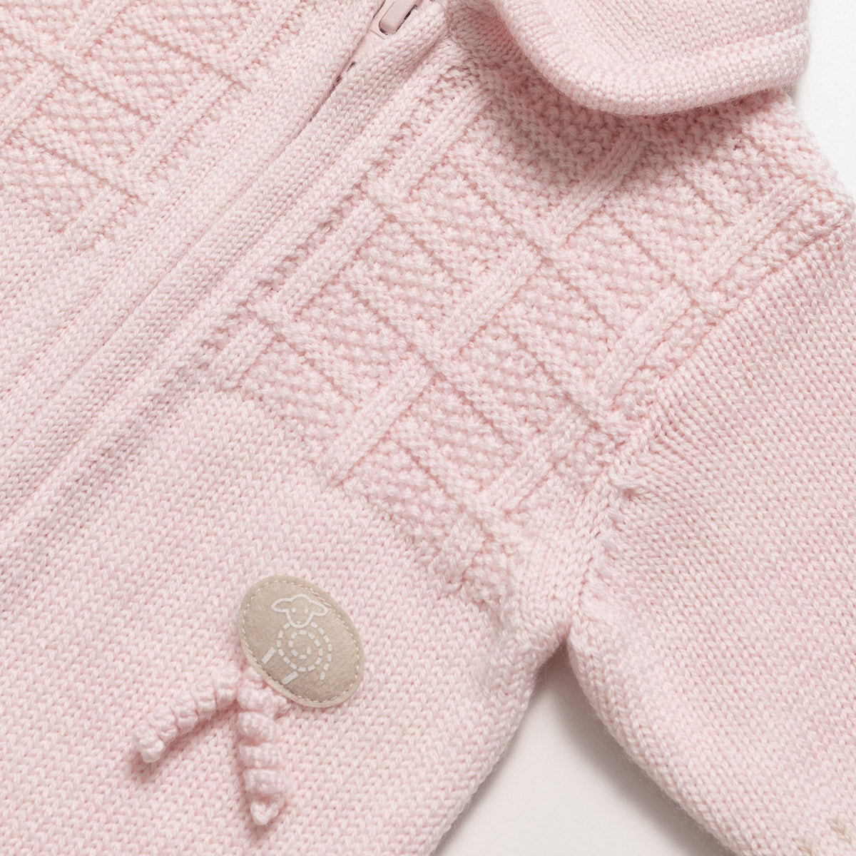 Lillelam Sparkedress i merinoull «Classic» Himmelrosa detalj